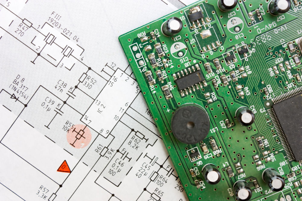 Printed circuit board with the circuit diagram on which it is based.